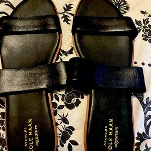 Black Cole Haan slip on sandals